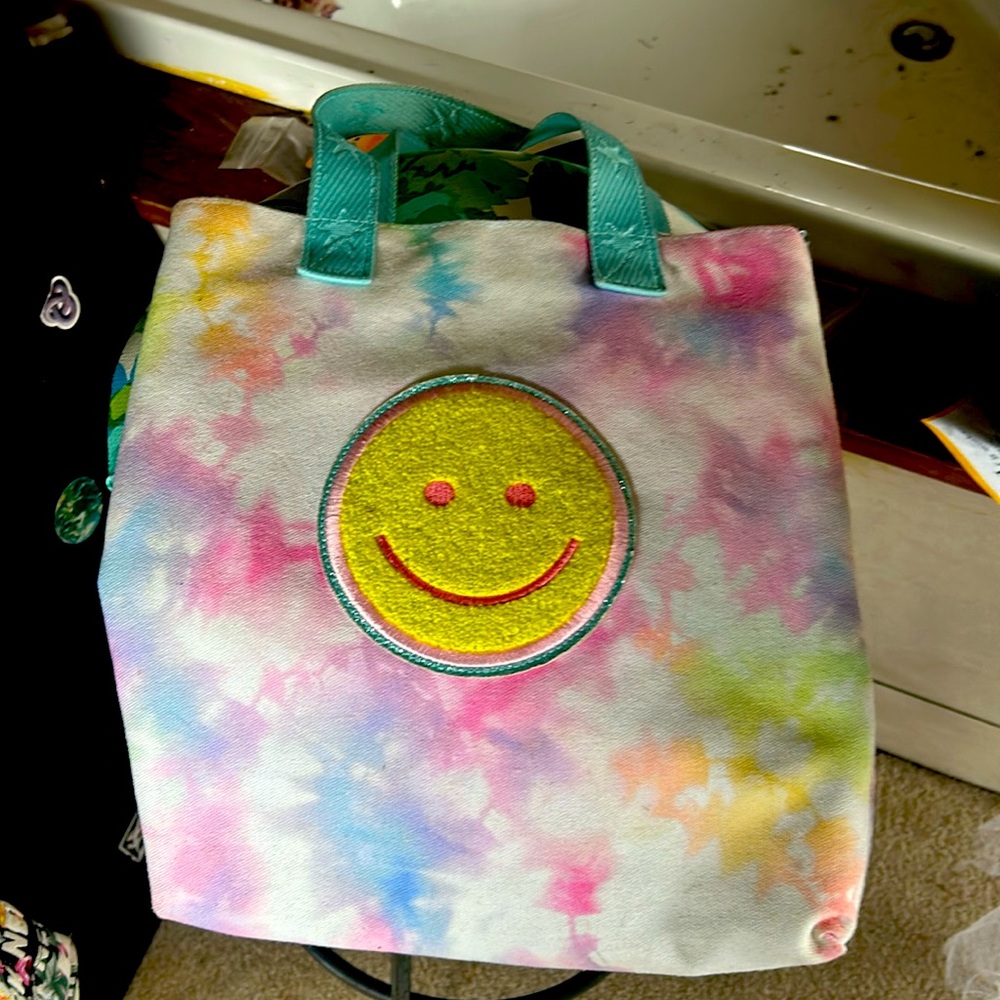 👜